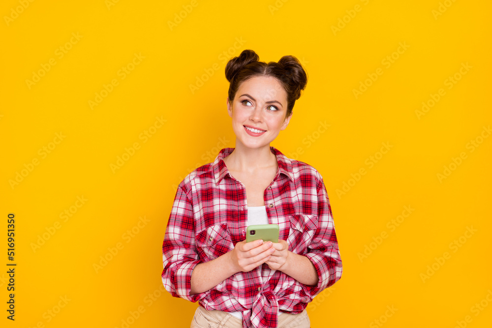 Photo of dreamy sweet lady blogger use device imagine million likes isolated on shine color background Photo of dreamy sweet lady blogger use device imagine million likes isolated on shine color background