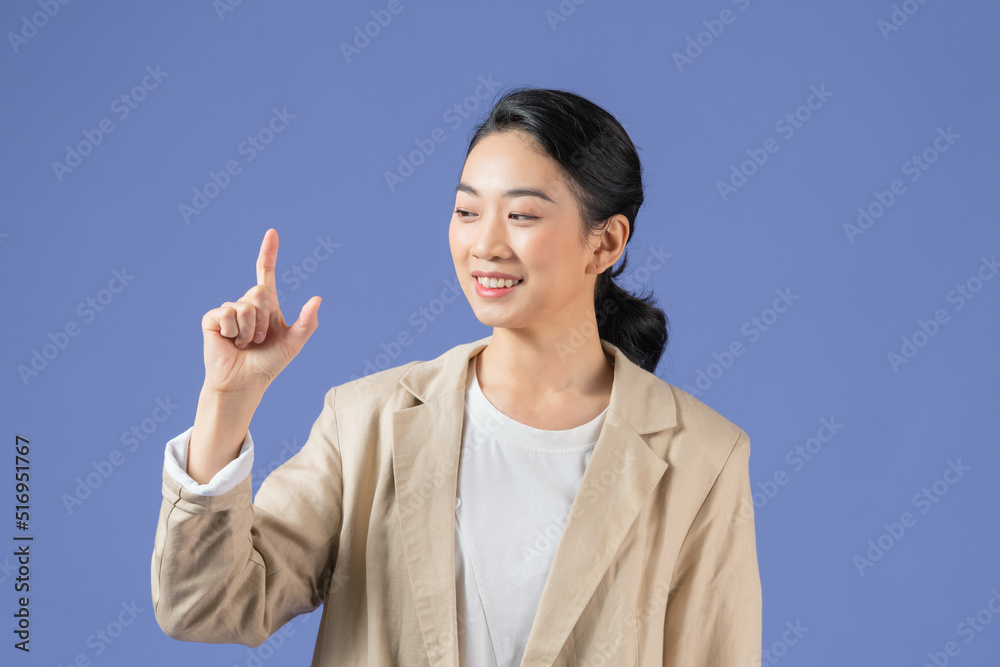 Asian girl holding something invisible in his hands, isolated Asian girl holding something invisible in his hands, isolated