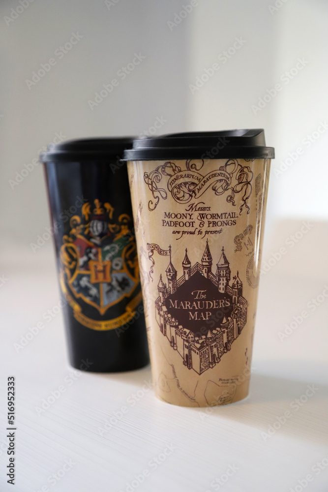 Harry Potter tall plastic cup. Hogwarts House Crest and Marauder's Map