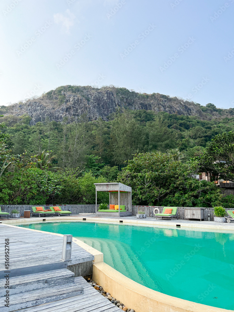 Swimming pool on roof top with beautiful mountain view.