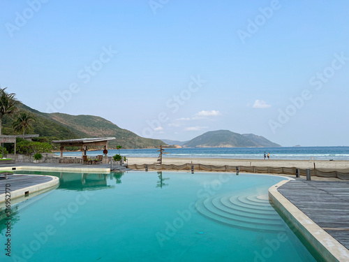 Pool and sea landscape on on tropical summer vacation