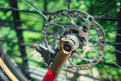 Modern bicycle disc brake rotors, close up view on bicycle hydraulic disc brakes