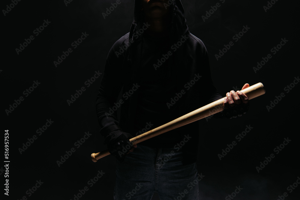 Cropped view of african american vandal holding baseball bat isolated on black - obrazy, fototapety, plakaty 