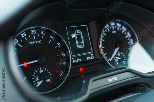 Modern car speedometer,odometer,tachometer and illuminated dashboard. car dashboard modern automobile controlilluminated panel speed display.Car instrument panel.Close up.Selective focus.
