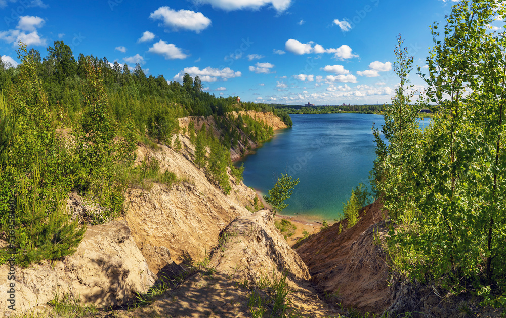 On the shore of the Pugarevsky quarry . Summer landscape. Leningrad region. Vsevolozhsk. On the shore of the Pugarevsky quarry . Summer landscape. Leningrad region. Vsevolozhsk.
