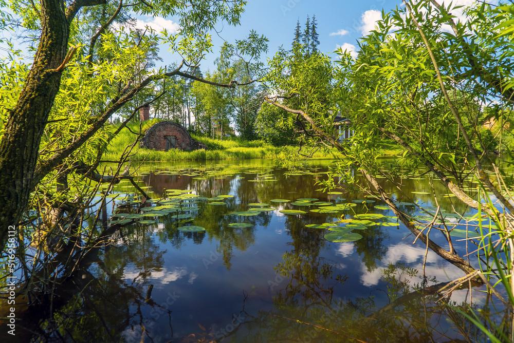 A blacksmith shop on the shore in the Priyutino estate. Vsevolozhsk. Leningrad region. A blacksmith shop on the shore in the Priyutino estate. Vsevolozhsk. Leningrad region.