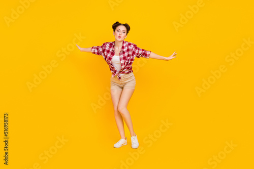Full length photo of lovely lady youth dance discotheque hands aside fly up like bird isolated vibrant color background