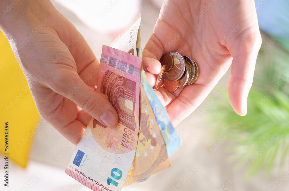 Inflation and hyperinflation financial concept. Property tax and money leverage. falling salaries and purchasing power. poverty and famine. Social security concept. euro banknotes and euro coins.