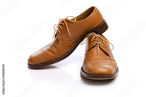 Male brown classic style shoes over white background. Vintage dress shoes. Concept of ad, sales , fashion, retro vintage style