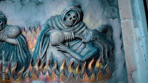 Billede på lærred A painting on a wall in a Buddhist temple depicting hell