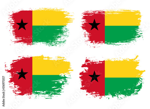 Artistic Guinea-Bissau country brush flag collection. Set of grunge brush flags on a solid background