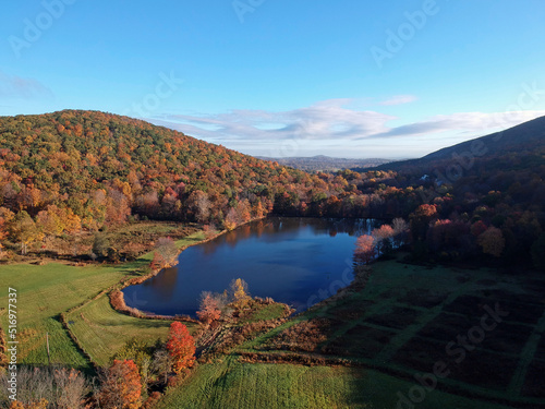 Aerial view of a lake and mountain in autumn