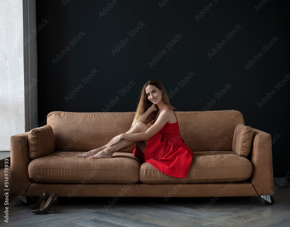 Obraz premium portrait of a young attractive woman on a dark background