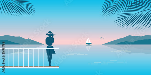 young woman on the bridge looks to the sea summer holiday background