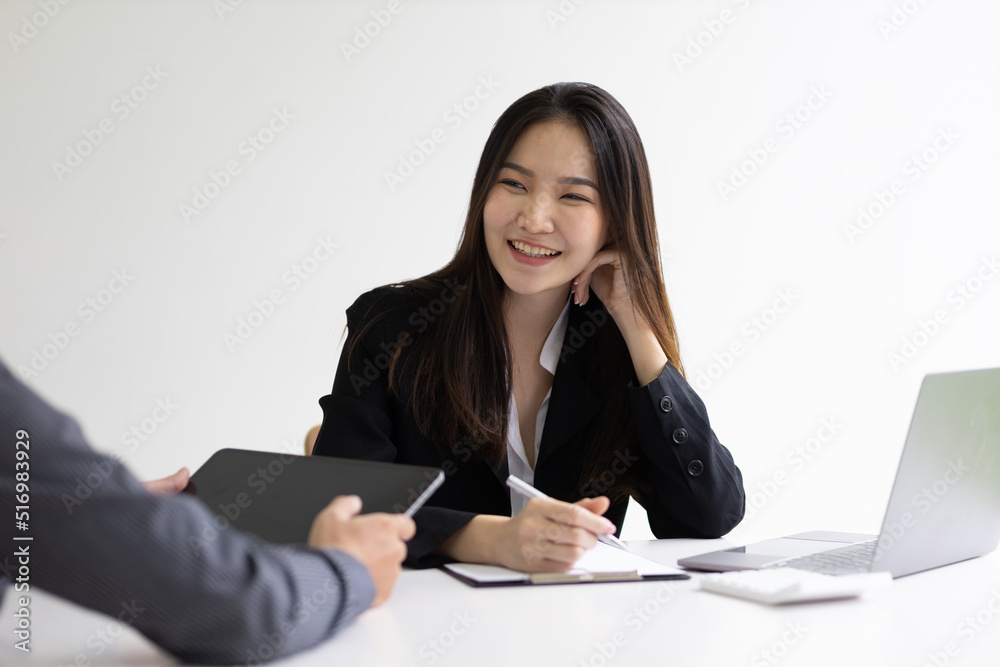 Business women in the office meeting with colleagues to plan a joint business project, financial advisor and job interview. Business women in the office meeting with colleagues to plan a joint business project, financial advisor and job interview.