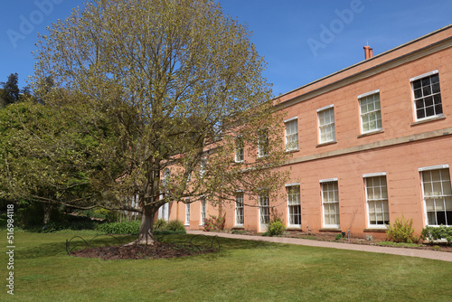 Wallpaper Mural Many windows on the side of a pink English country house Torontodigital.ca