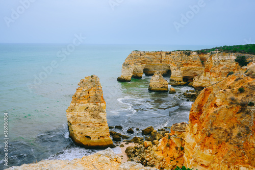 beach and rocks on algarve portugal