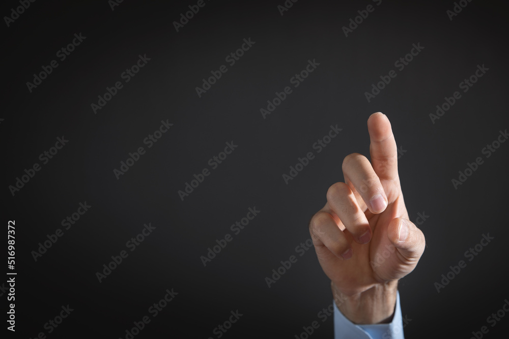 Pointing or touching finger in screen. Pointing or touching finger in screen.