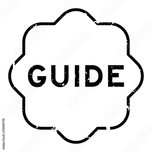 Grunge black guide word rubber seal stamp on white background