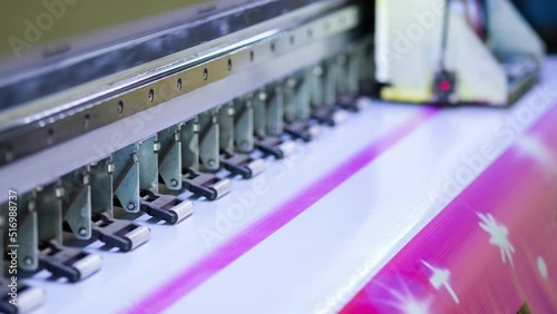 Large Inkjet printer working on vinyl banner