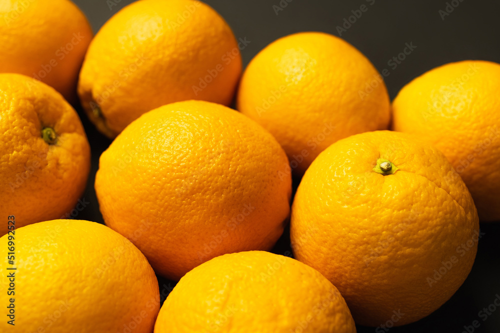 Close up view of tropical oranges isolated on black. Close up view of tropical oranges isolated on black.