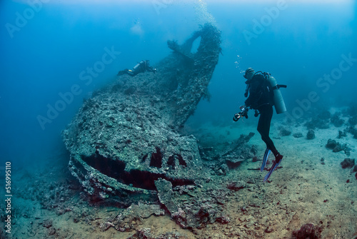 Two divers exploring the ship wreck Dunraven in the red sea
