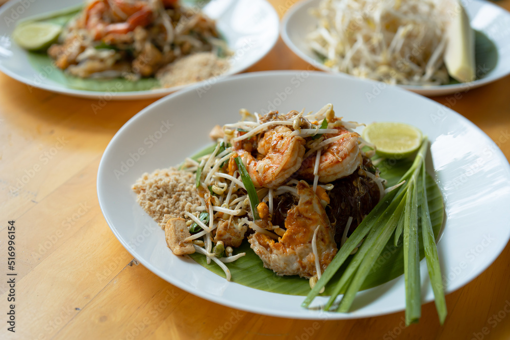 Close-up of Pad Thai Seafood, a dish made from noodles, is a famous dish of Thailand recommended for tourists visiting the country. It consists of rice noodles and shrimp and squid.