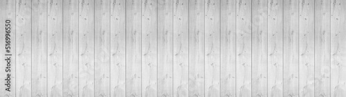 White gray grey rustic light bright wooden oak texture - Wood boards background panorama banner long, flooring backgrounds, parquet floor or laminate.