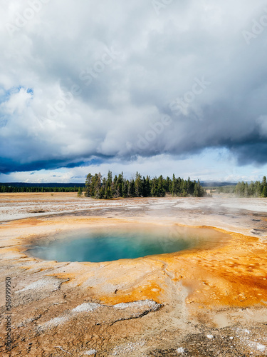Overcast cloudy weather at small geothermal hot spring in Yellowstone national park 