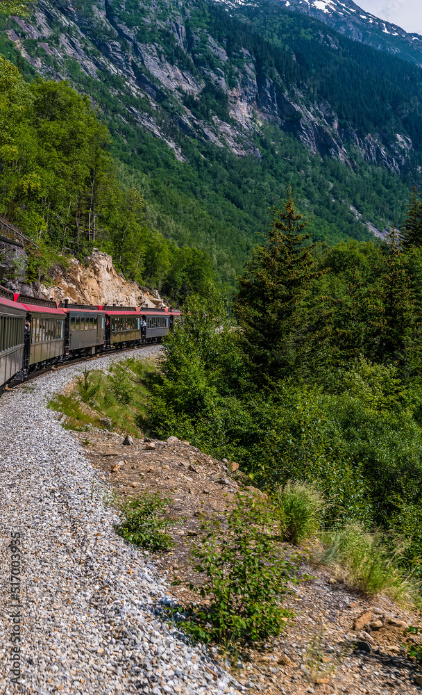A view looking back down the White Pass and Yukon railway near Skagway, Alaska in summertime
