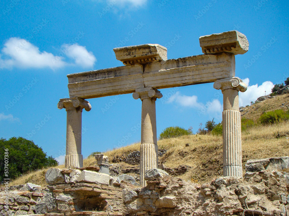 Ruins of the entrance to the temple with columns in the ancient city of Ephesus, Turkey.
