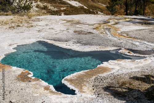 High angle shot of a flowing geyser in Yellowstone National Park