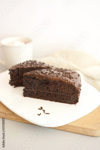 Chocolate cake slices on white background