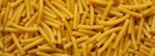 Dry Organic Maccheroni Pasta, top view. Flat lay, overhead, from above.