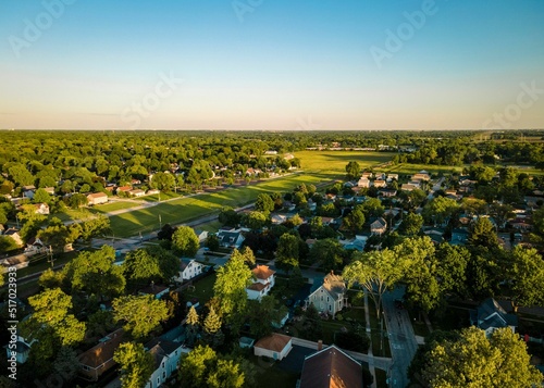 Aerial view of a West Chicago, IL neighborhood at golden hour sunset