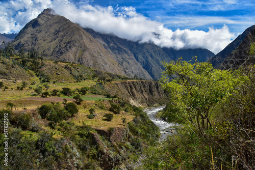 Hiking in the cloud forests and green valleys of the Inca Trail on the way to Machu Picchu in Peru