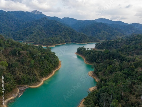 Mesmerizing scene of Lake Ruataniwha between green mountains in New Zealand photo