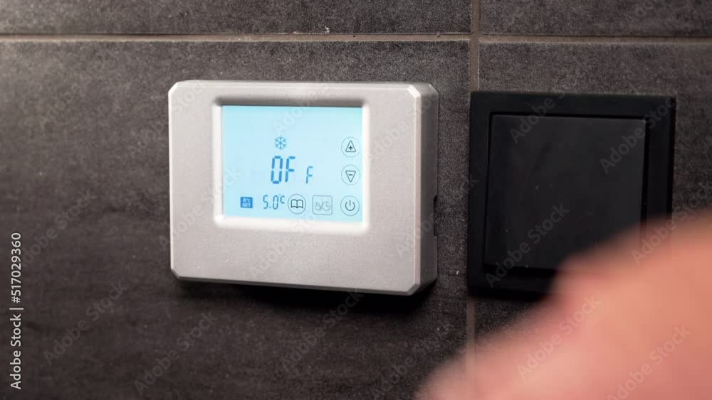 Digital thermostat with LCD display being turned off Digital thermostat with LCD display being turned off