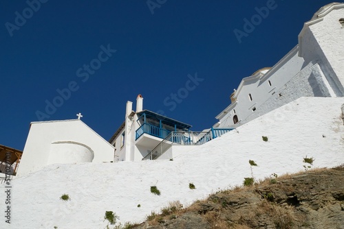 Byzantine Christian church, on a rock, on a Greek island.  wonderful architecture, Greece photo