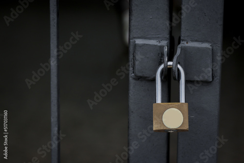 Wire fence door with lock.