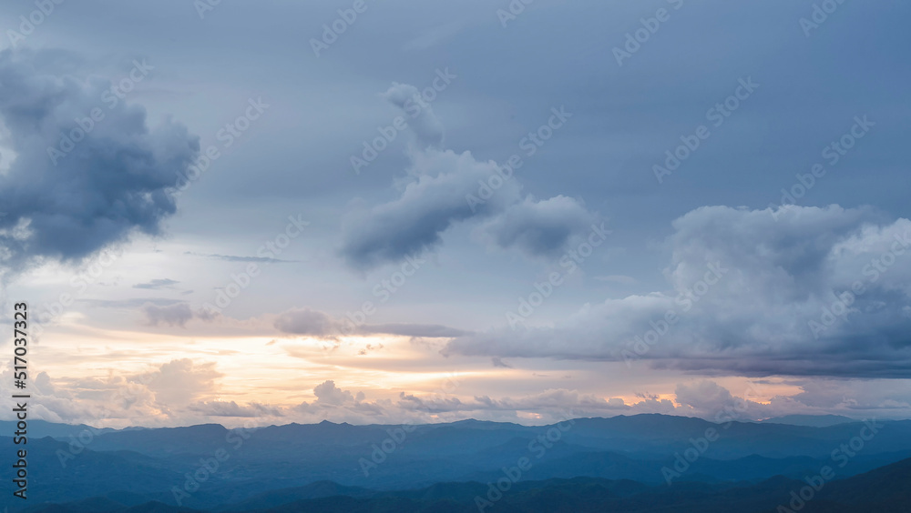 Beautiful landscape of mountain range during sunrise morning dawn. Mountain peaks with cloud and sunlight at dawn. Chiang Mai, Thailand.