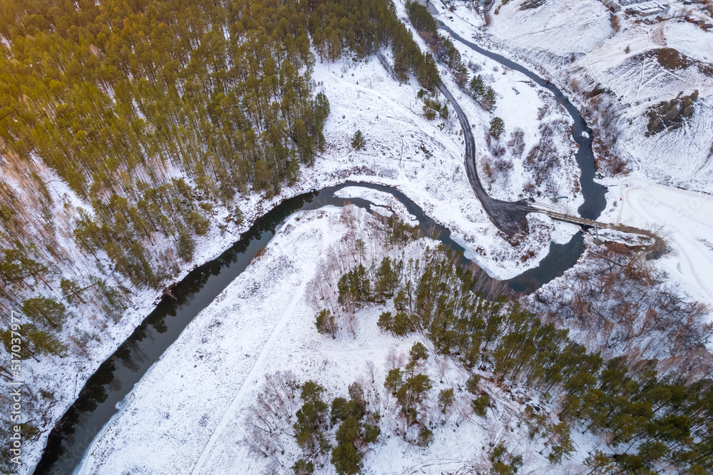 turn of the river in the forest area winter, aerial view of the winter landscape
