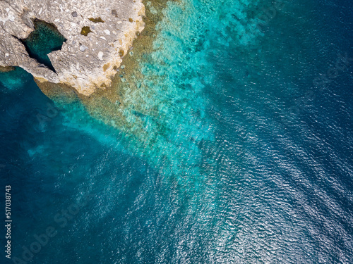 Fototapeta Naklejka Na Ścianę i Meble -  Italy, July 2022: rocky coves, Caribbean sea at the tremiti islands in Puglia