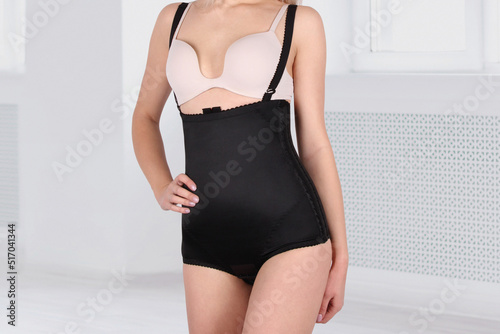 Postnatal Bandage. Medical Compression underwear. Orthopedic bandage underpants for lowering of the pelvic organs. Postpartum Tummy Control Belly Bandage. Female Bodyshaper. Postoperative trousers. photo