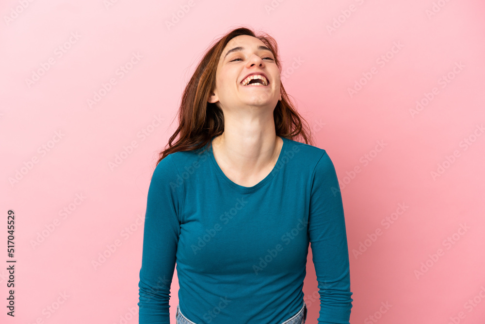 Young caucasian woman isolated on pink background laughing Young caucasian woman isolated on pink background laughing