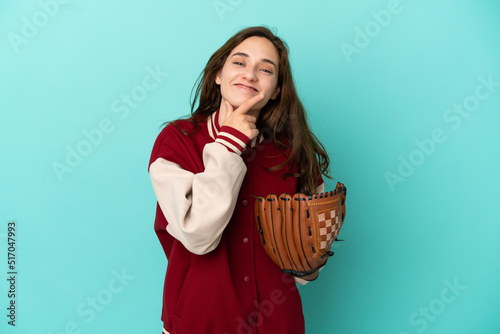 Photography Young caucasian woman playing baseball isolated on blue background happy and smi