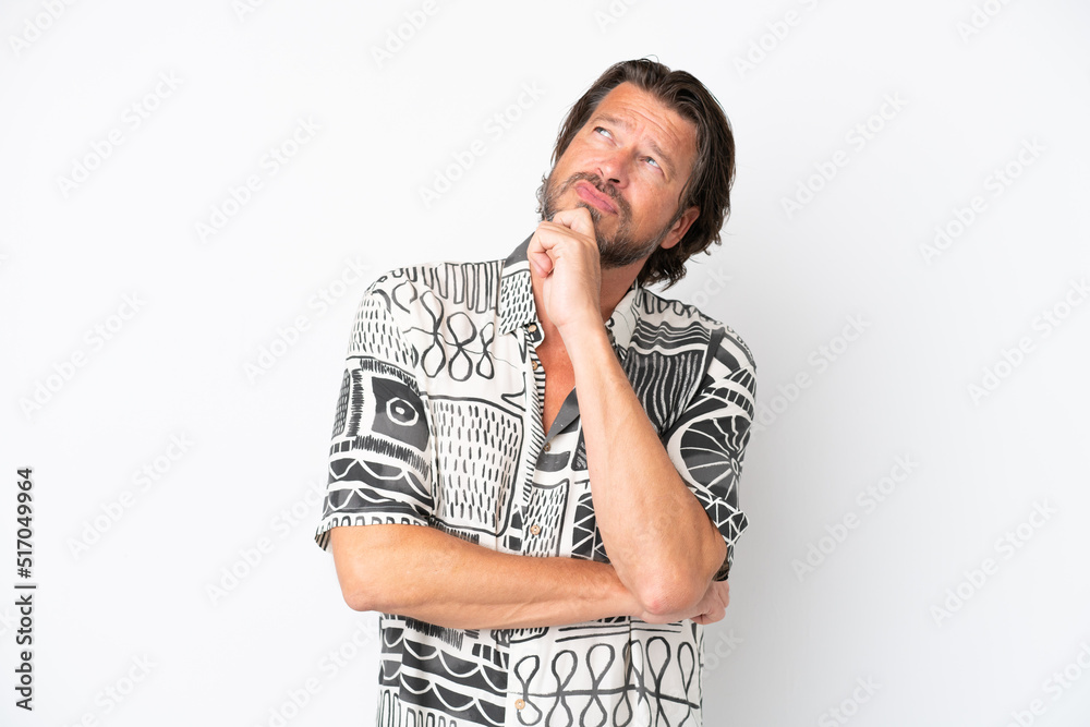 Senior dutch man isolated on white background and looking up Senior dutch man isolated on white background and looking up
