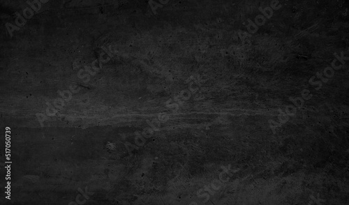 dark black stain cement floor texture use as background with blank space for design. raw beton brut grunge concrete wall or floor texture. weathered modern interior design background wallpaper.