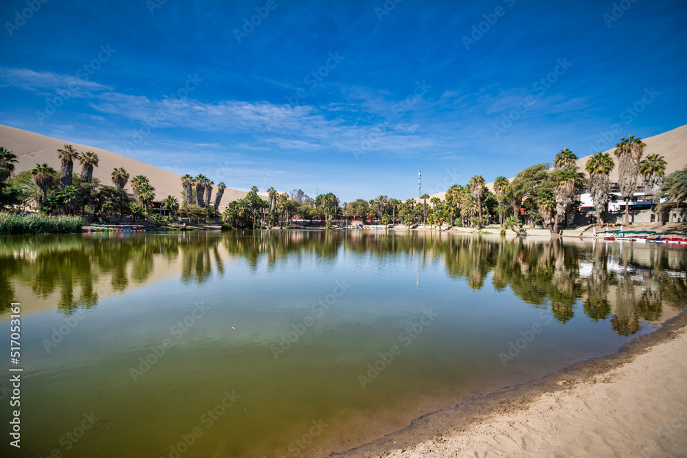 Huacachina is a desert oasis and a small village just west of the city of Ica in southwestern Peru