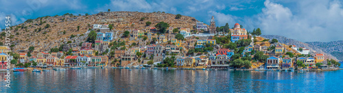Symi harbour, Greece, with colorful neoclassical mansions © Florin